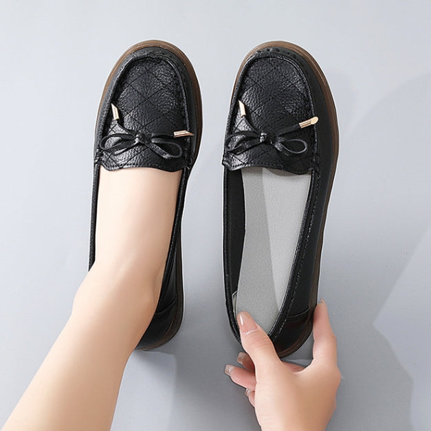 Zapatos de suela blanda con lazo