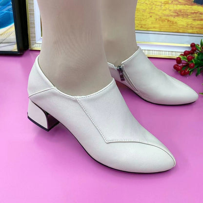 Zapatos de piel con suela blanda y tacón grueso