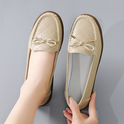 Zapatos de suela blanda con lazo