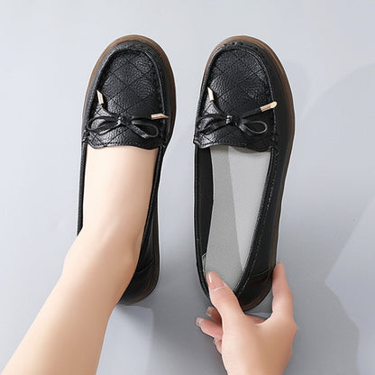 Zapatos de suela blanda con lazo