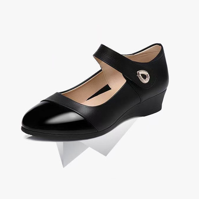 Zapatos de cuero con suela blanda y punta redonda