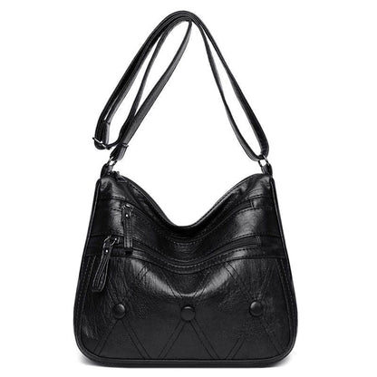 Bolso de piel suave con botones