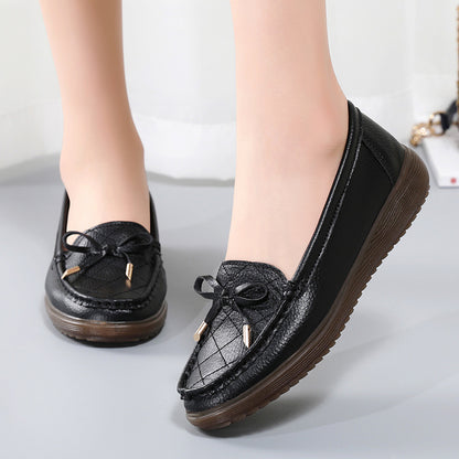 Zapatos de suela blanda con lazo