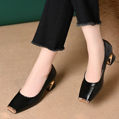 Zapatos de vestir con punta de metal y acabado piel de serpiente