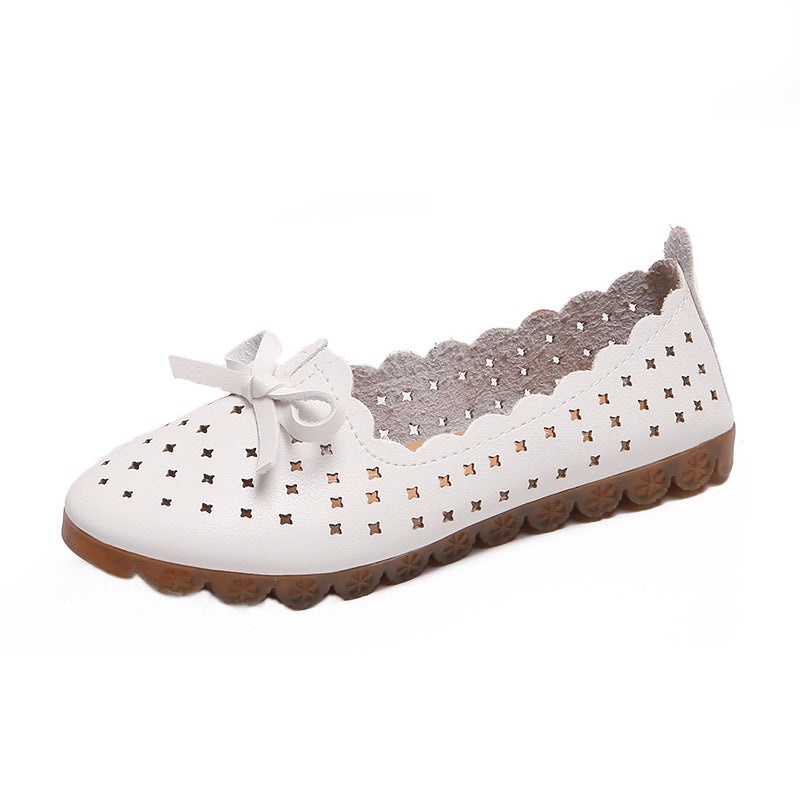 Mocasines con tacón bajo y agujeros