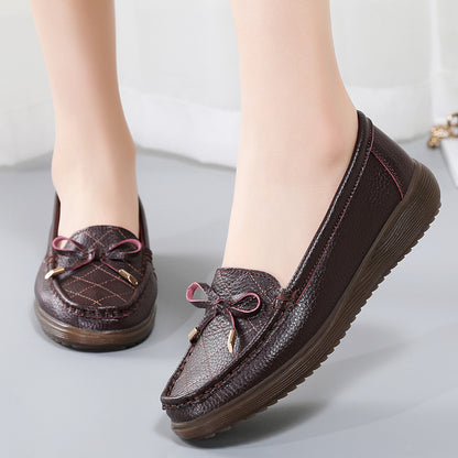 Zapatos de suela blanda con lazo