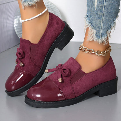 Zapatos de piel con lazo y corte bajo