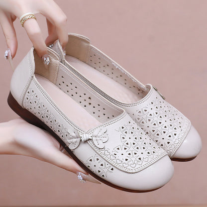 Zapatos de suela suave de goma flexible con perforaciones