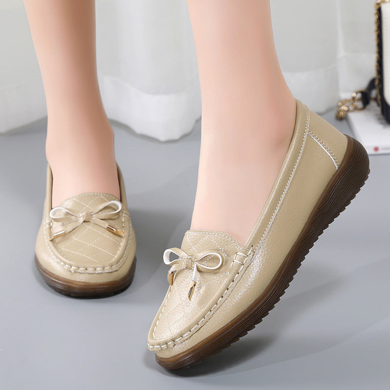Zapatos de suela blanda con lazo