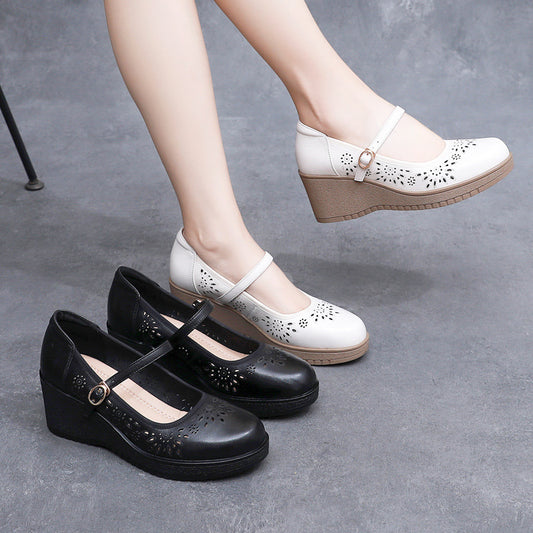 Zapatos de cuero con cuña y agujeros huecos