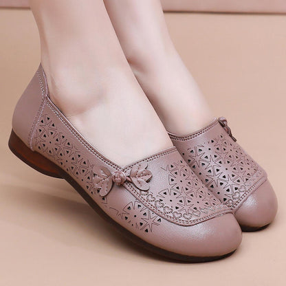 Zapatos de suela suave de goma flexible con perforaciones