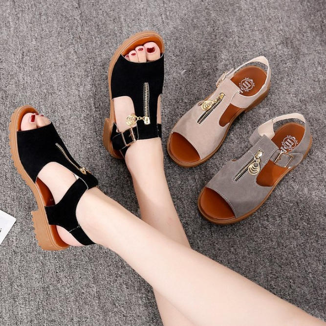 Sandalias planas de piel de res con tacón bajo