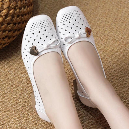 Zapatos de piel con perforaciones y suela suave