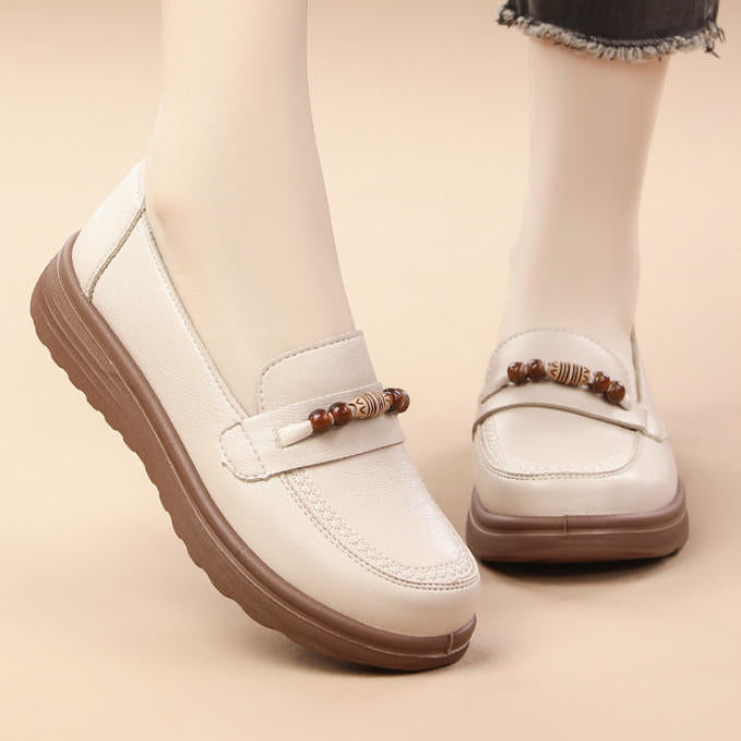 Mocasines de piel suave tipo slip-on