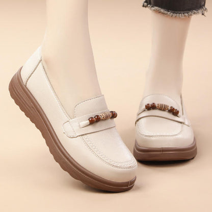 Mocasines de piel suave tipo slip-on